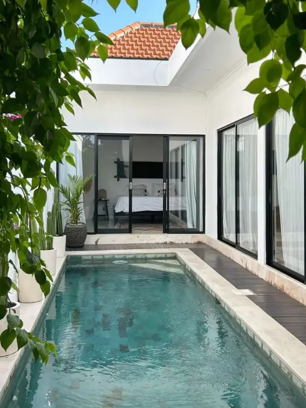 Modern villa pool with natural volcanic stone